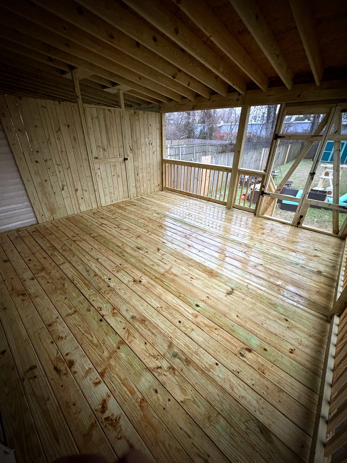 Interior deck floor of screened porch