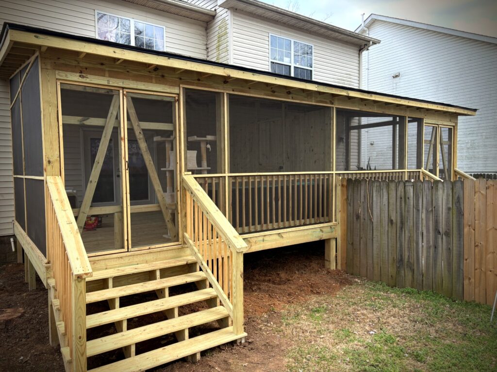 Screened porch and deck addition with stairs built by Proper Deck and Fence Middle Tennessee